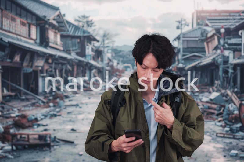 地震で被災した男性