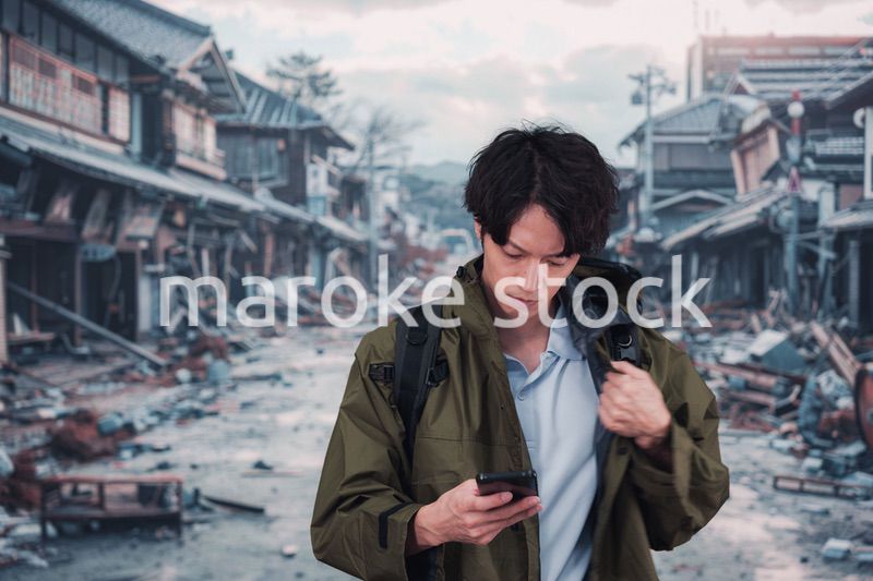 地震で被災した男性