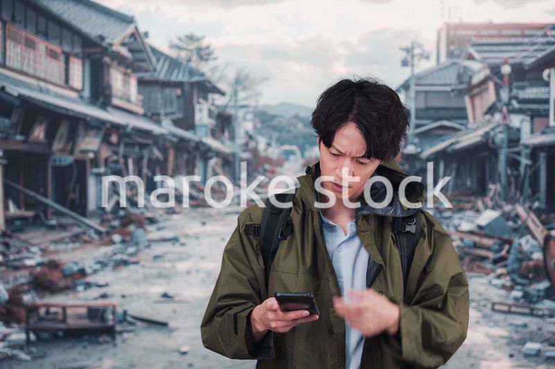 地震で被災した男性