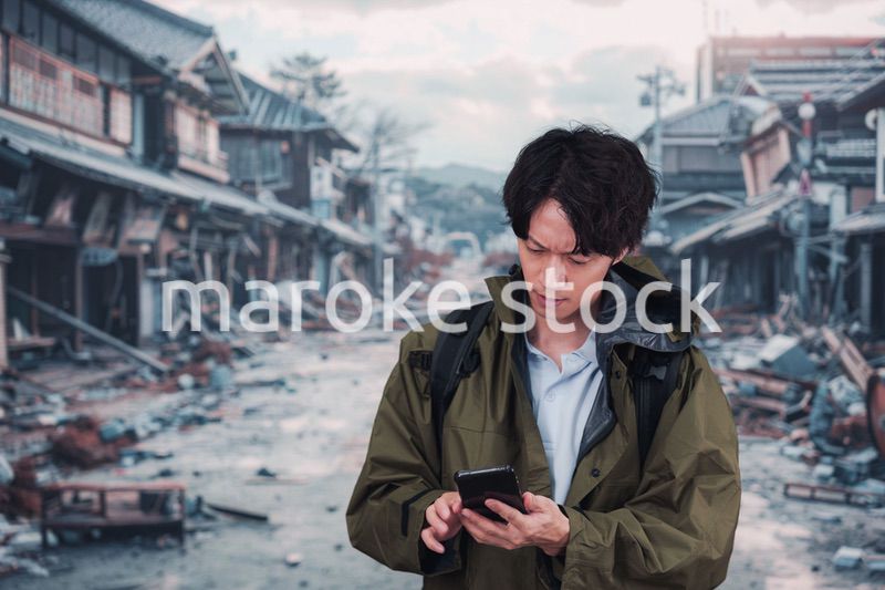 地震で被災した男性