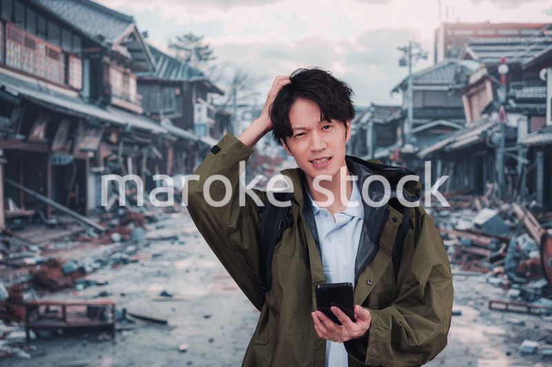 地震で被災した男性