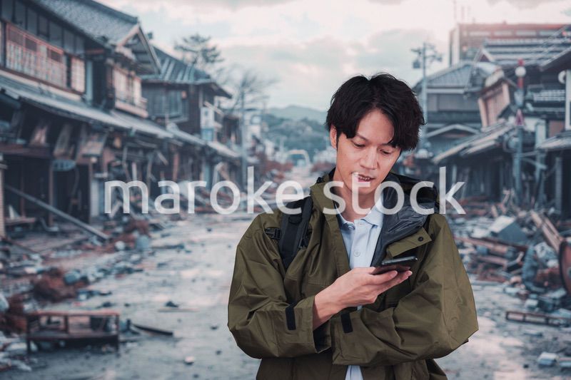 地震で被災した男性