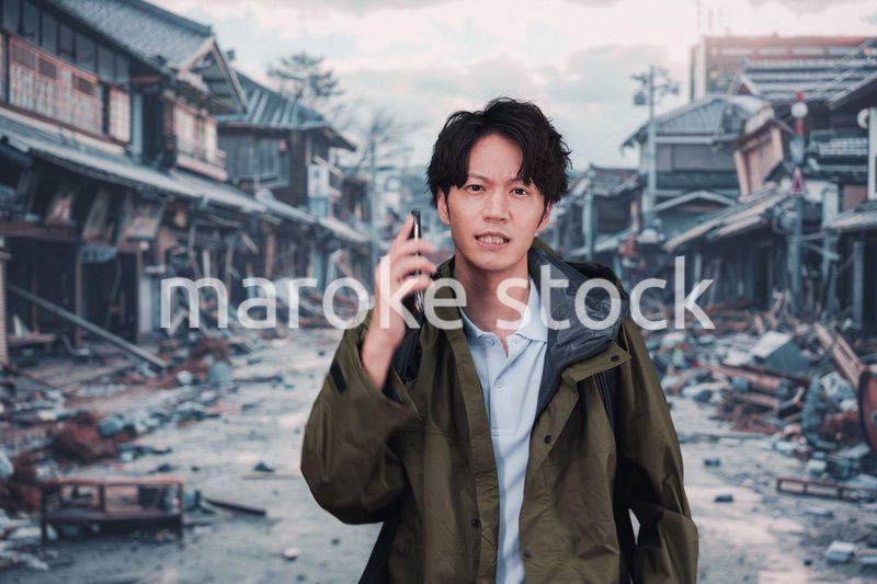 地震で被災した男性