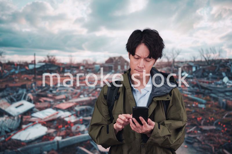 地震で被災した男性