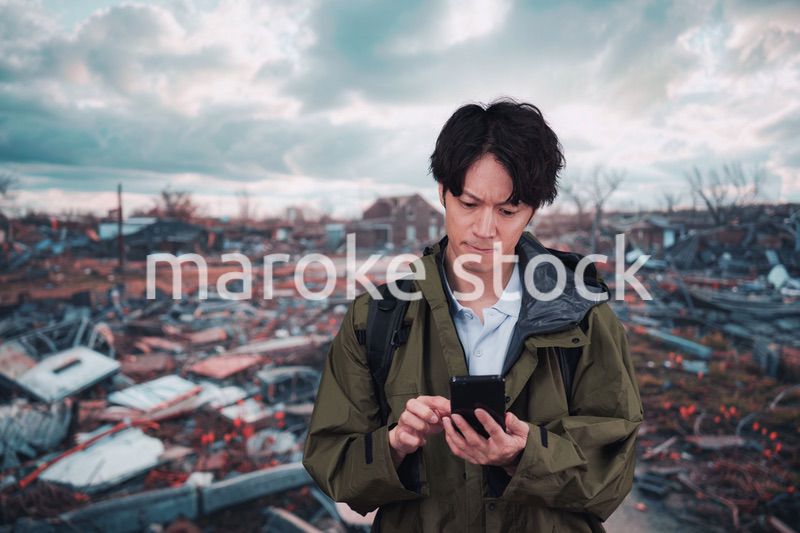 地震で被災した男性