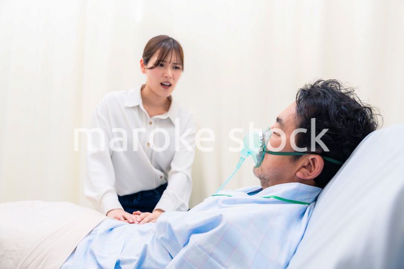 人工呼吸器をつけた男性と病院に駆けつけた家族