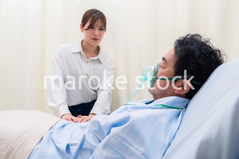 人工呼吸器をつけた男性と病院に駆けつけた家族