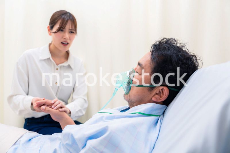 人工呼吸器をつけた男性と病院に駆けつけた家族