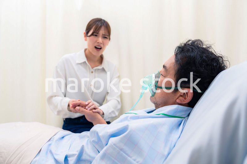 人工呼吸器をつけた男性と病院に駆けつけた家族