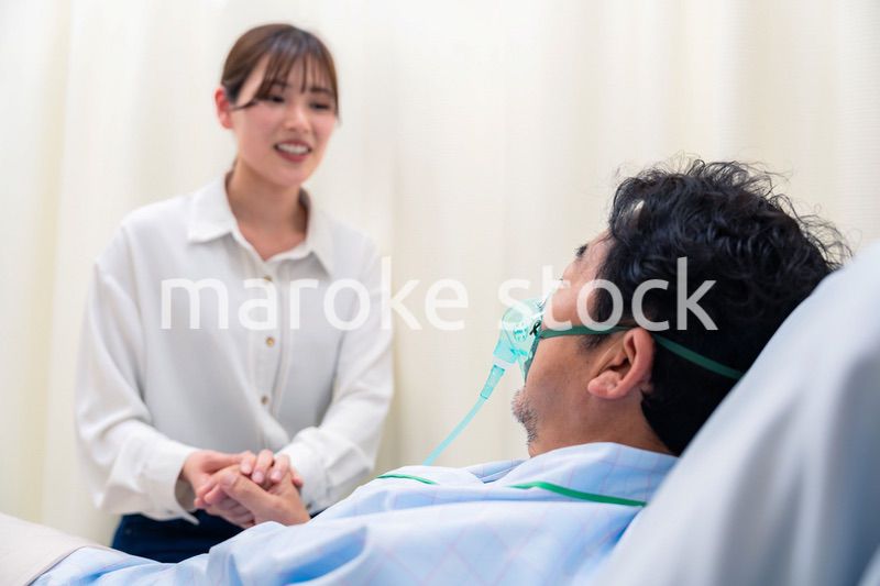人工呼吸器をつけた男性と病院に駆けつけた家族