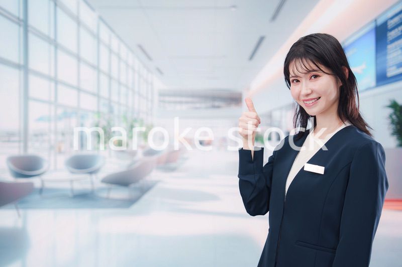 オフィスの受付で働く受付嬢