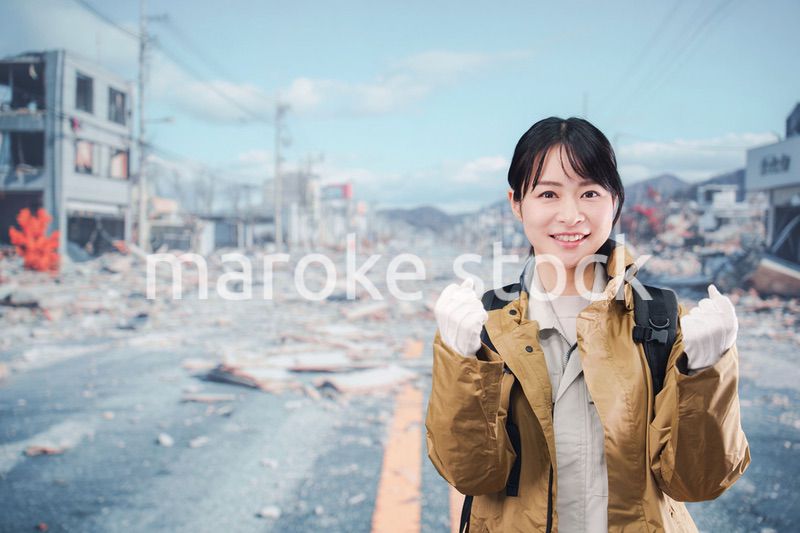 災害で被災し避難をする女性