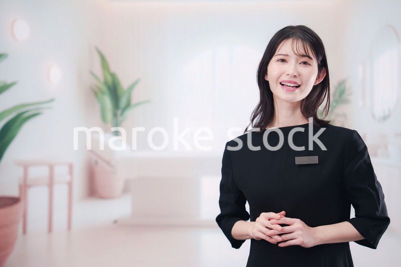 サロンで働く若い女性のスタッフ