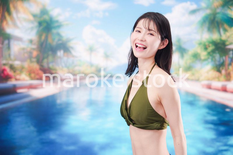 リゾートのプールで夏を楽しむ若い女性