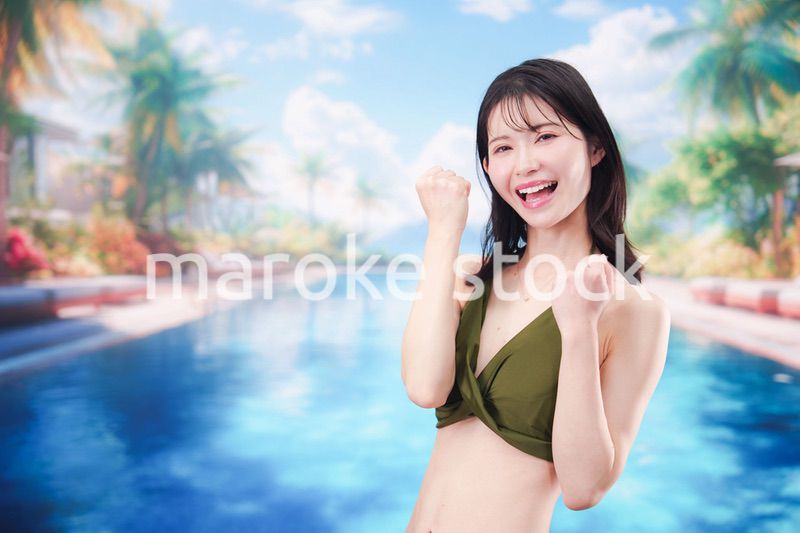 リゾートのプールで夏を楽しむ若い女性