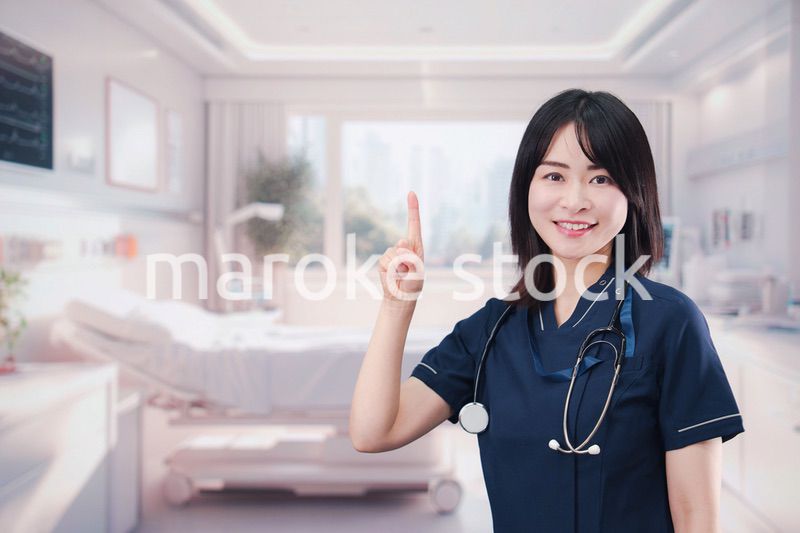 入院病棟の病室で生き生きと働く若い女性