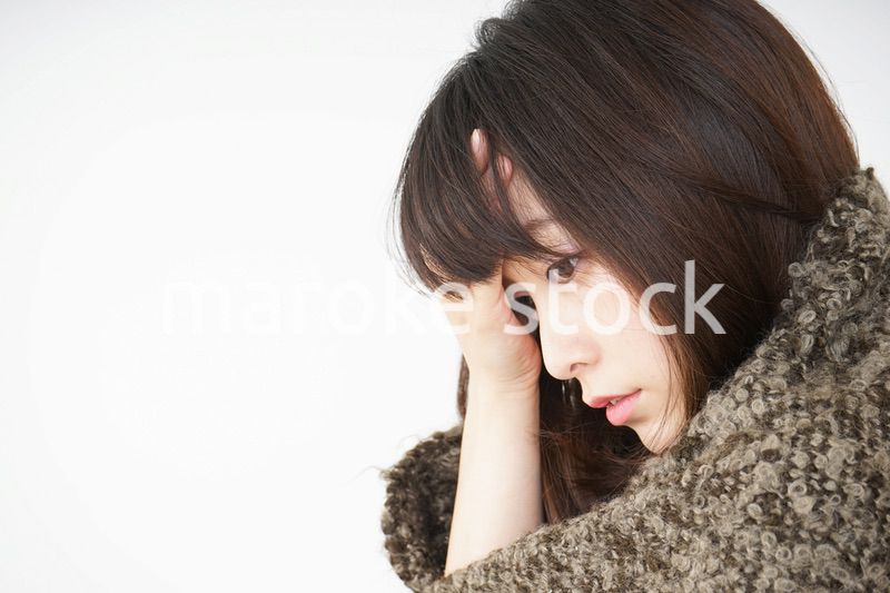 風邪で発熱した若い女性