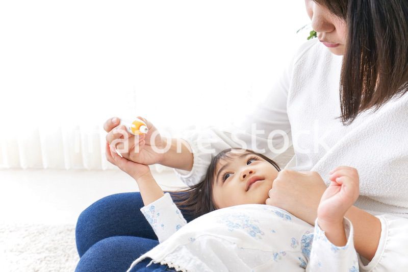 体調不良の子供