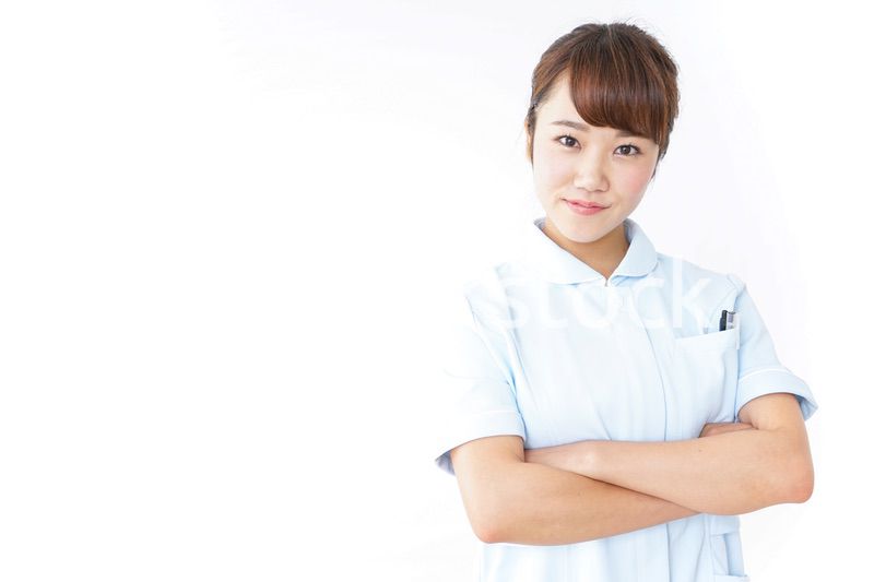 ガッツポーズをする看護師