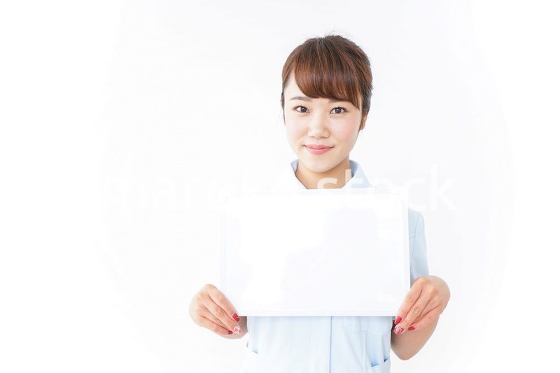 ホワイトボードと看護師