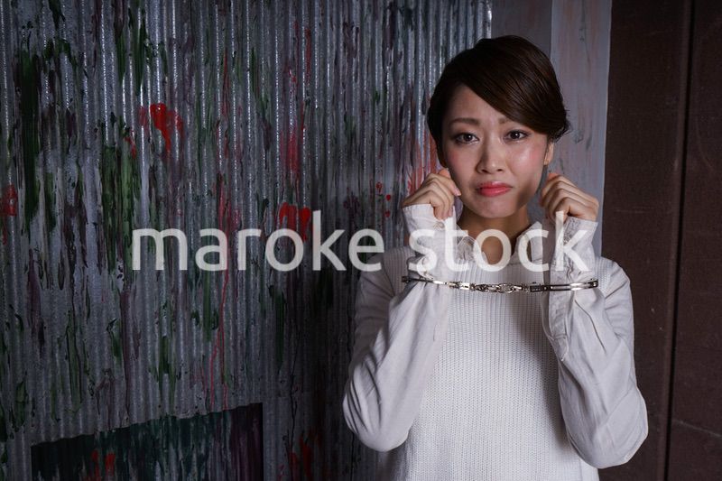 逮捕された女性