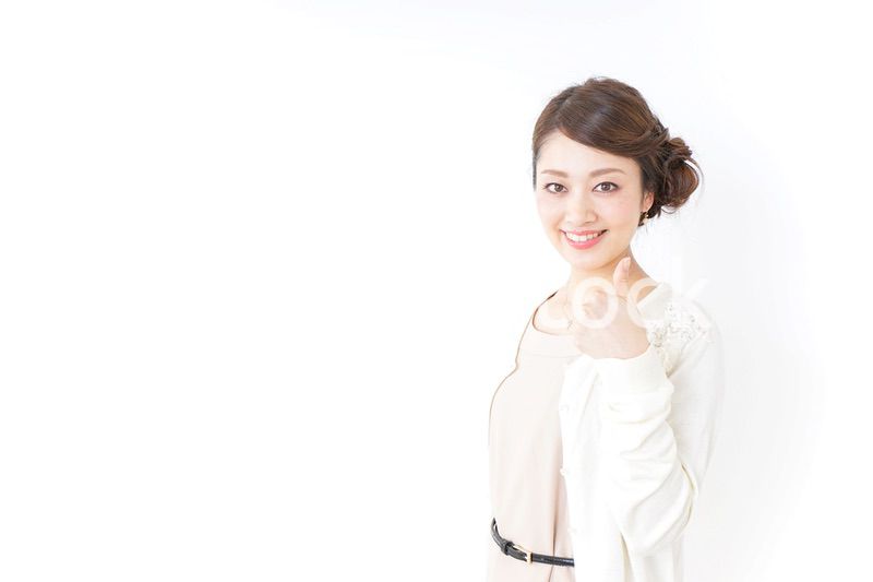 OKサインをする女性