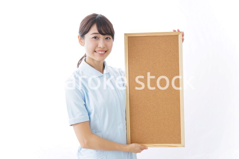 ボードを持つ看護師