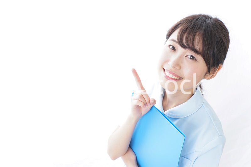 アドバイスをする看護師