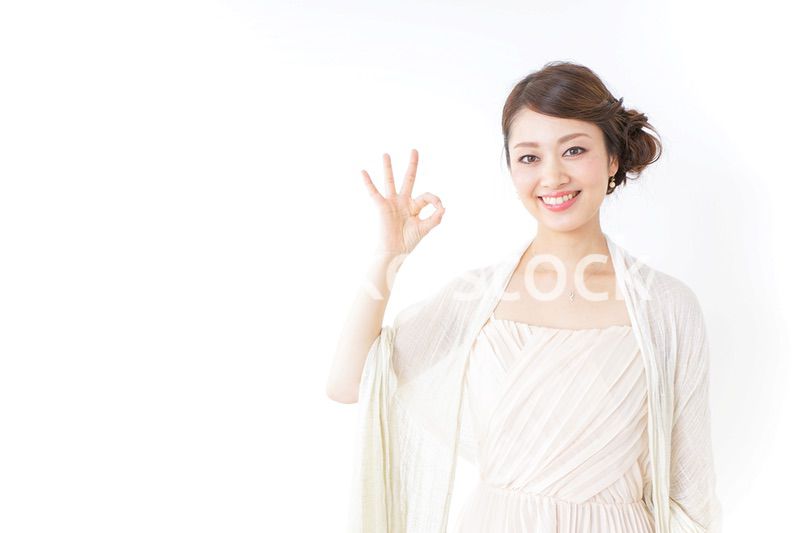 OKサインをする女性