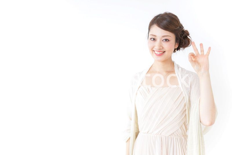 OKサインをする女性