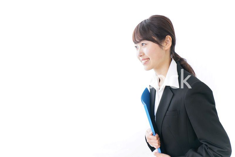 お辞儀をするビジネスウーマン