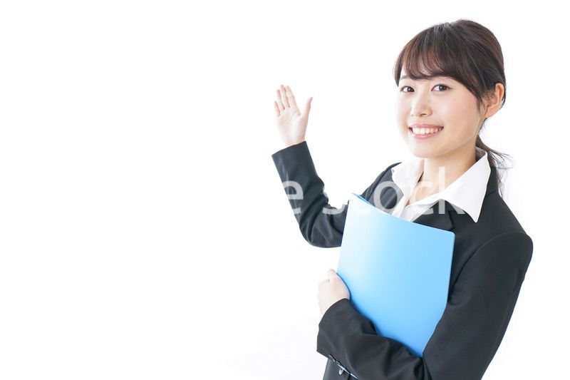指をさすビジネスウーマン