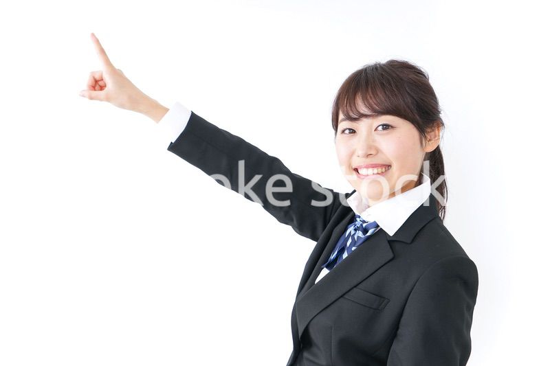 将来を指差す女子高生