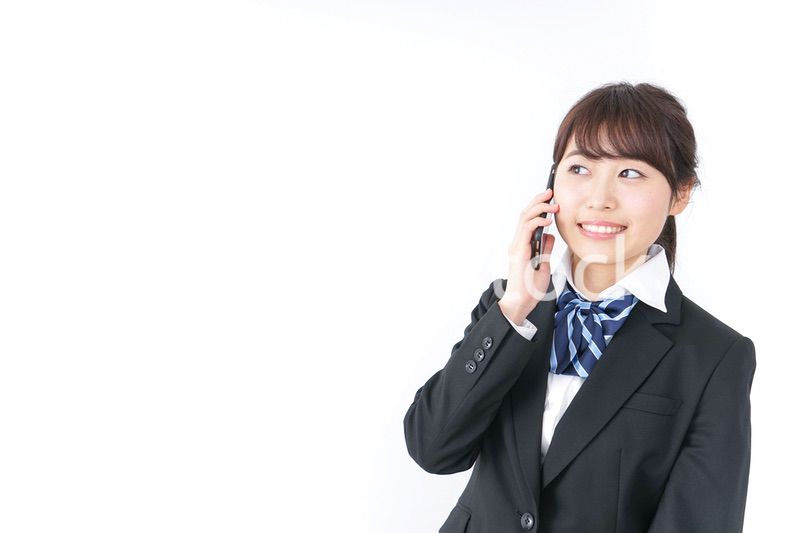 スマホを使う女子高生