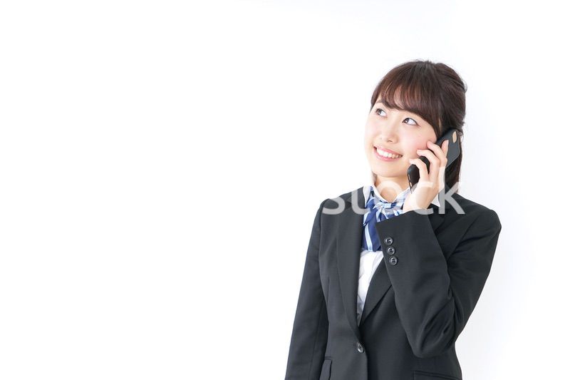 スマホを使う女子高生