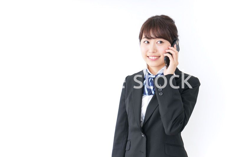 スマホを使う女子高生