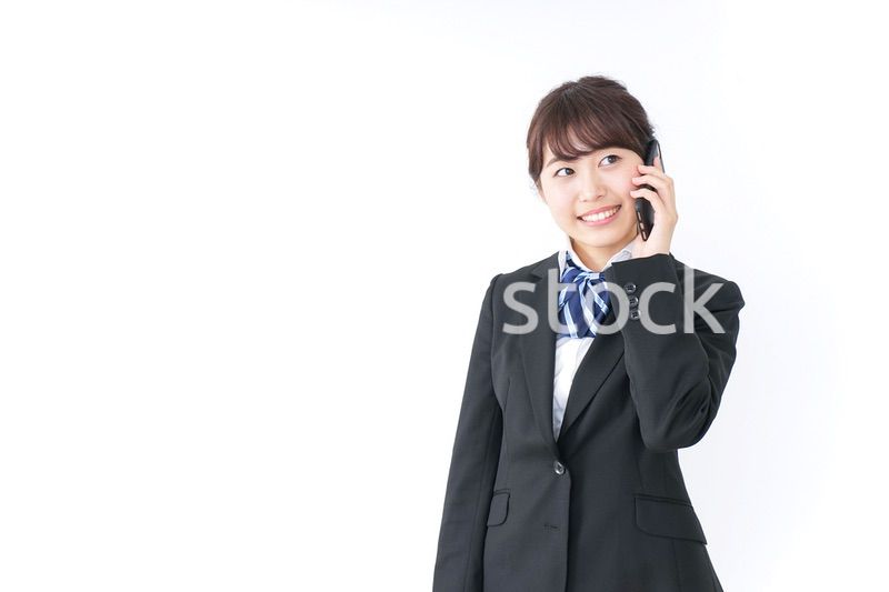 スマホを使う女子高生