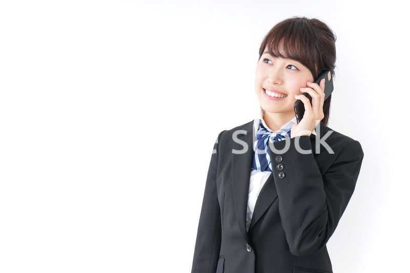 スマホを使う女子高生