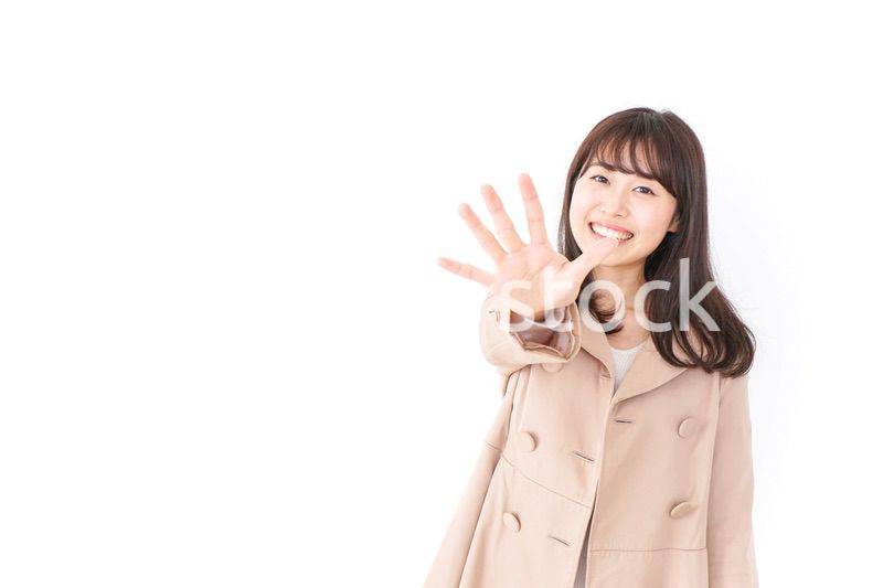 コートを来た女性