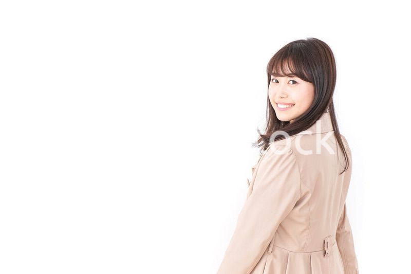 コートを来た女性