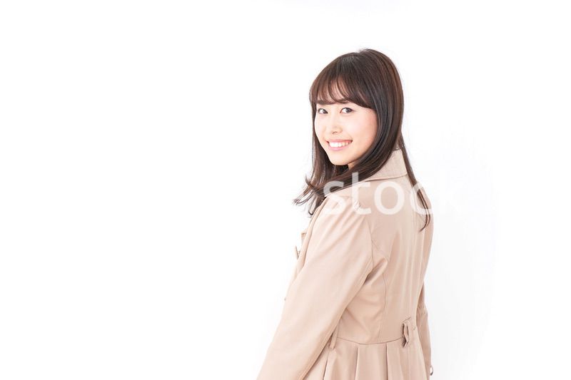 コートを来た女性