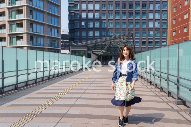 Young woman walking with casual wear