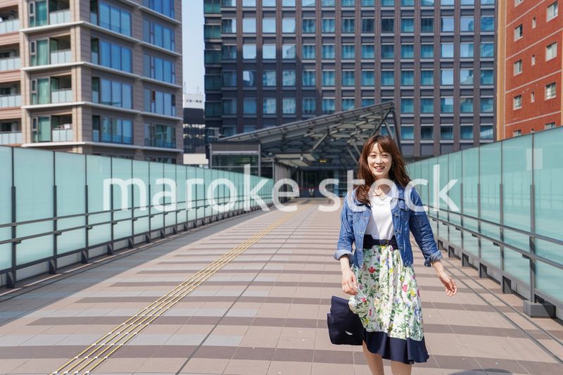 Young woman walking with casual wear