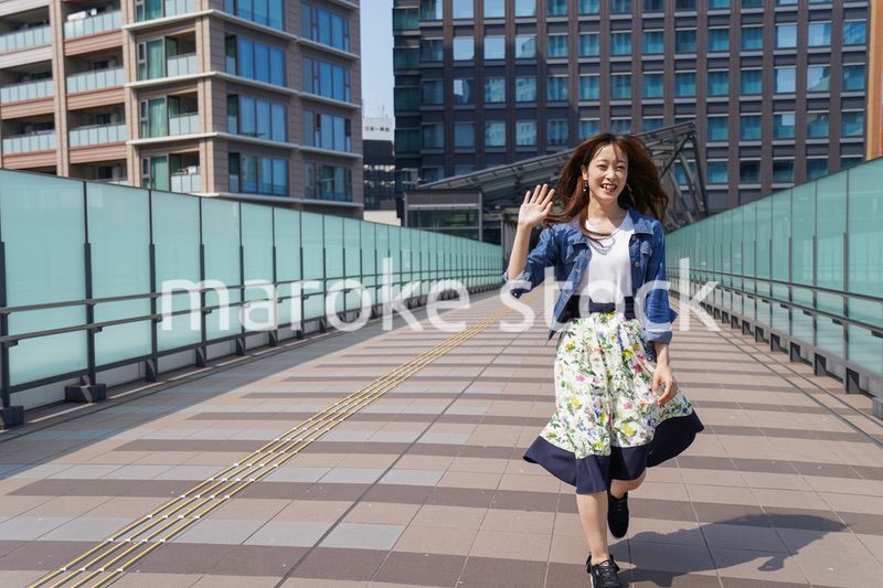 Young woman walking with casual wear