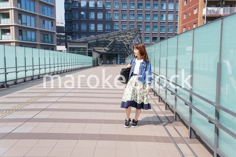 Young woman walking with casual wear