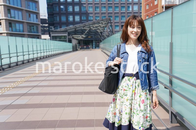 Young woman walking with casual wear