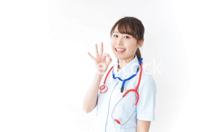 OKサインをするナース
