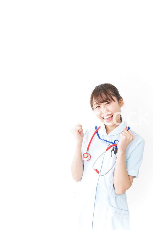 ガッツポーズをするナース