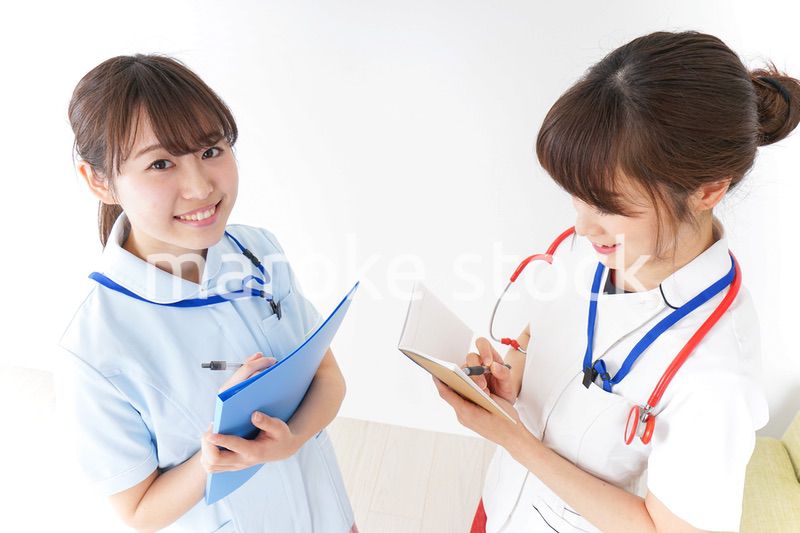 打ち合わせをするナース