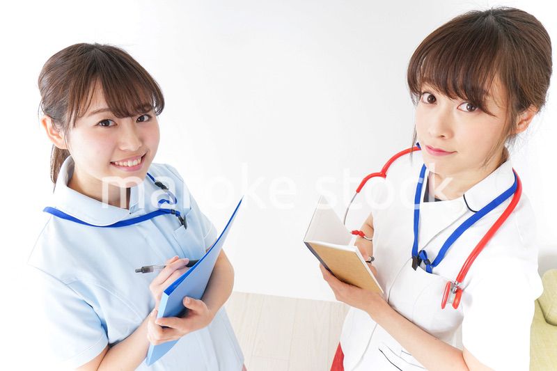 打ち合わせをするナース